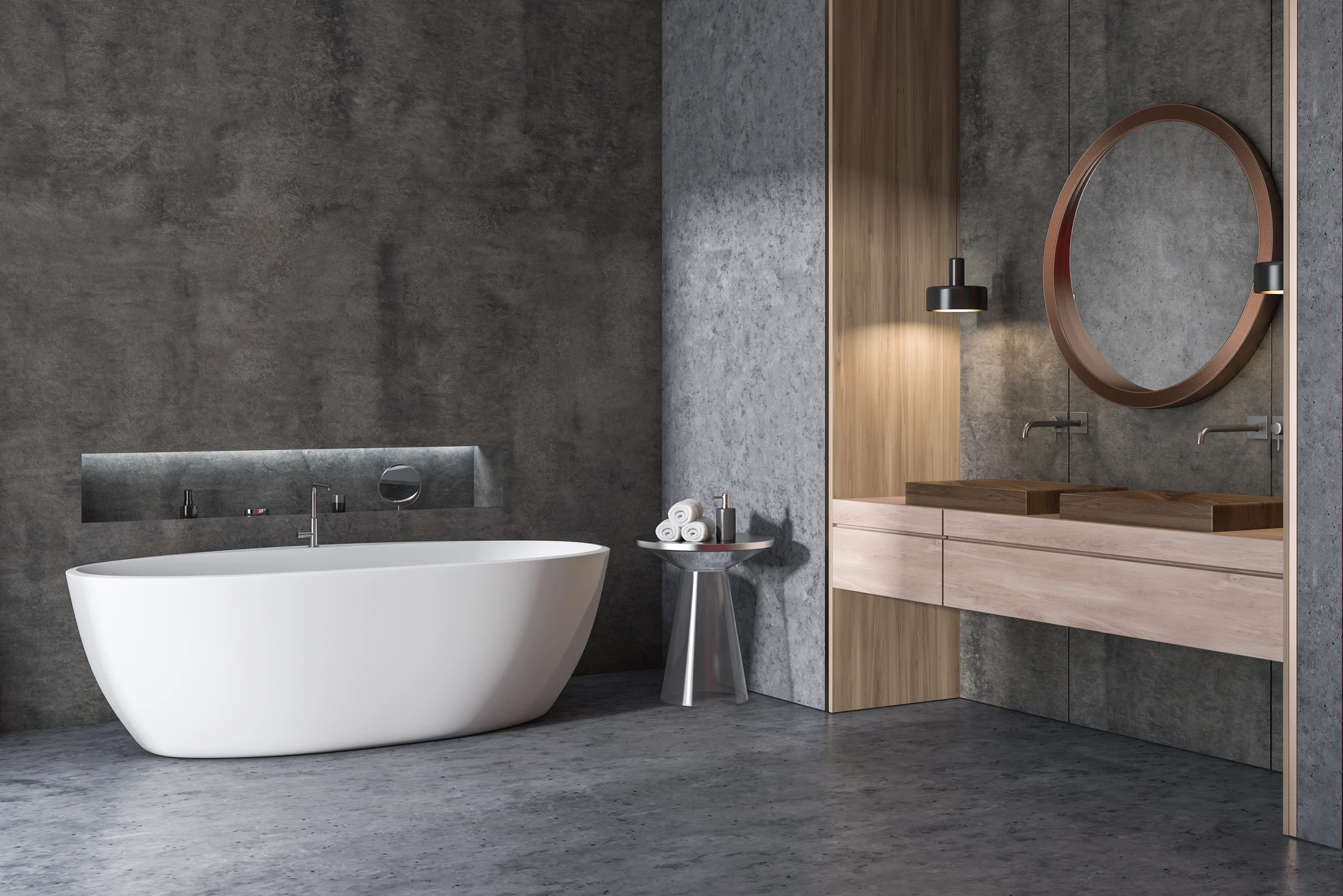Plombier en salopette bleue réparant la plomberie sous un lavabo de salle de bain, allongé au sol avec des outils
